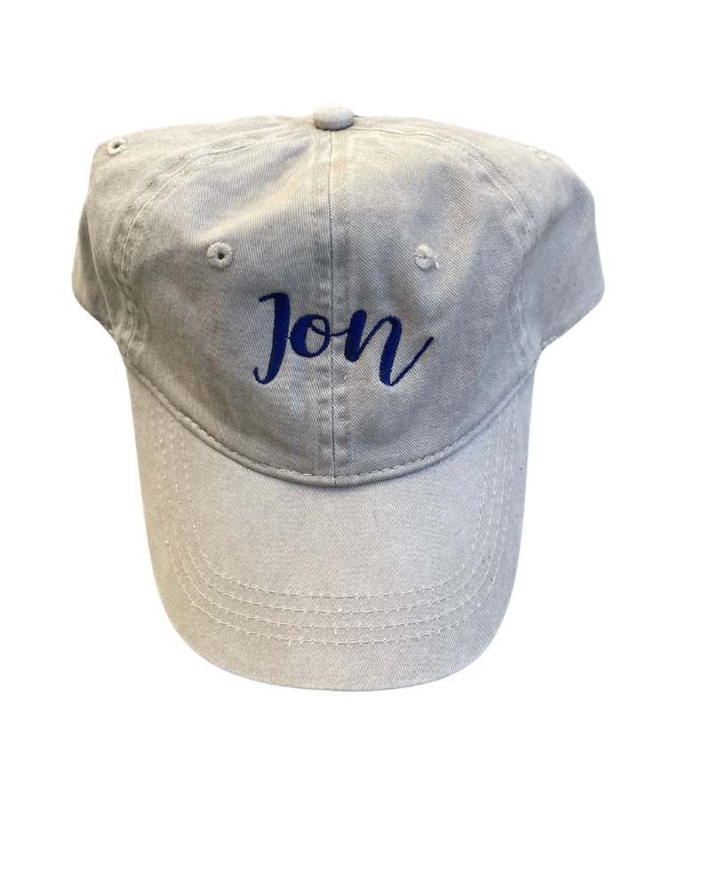 Beige cap with Jon embroidery in navy blue