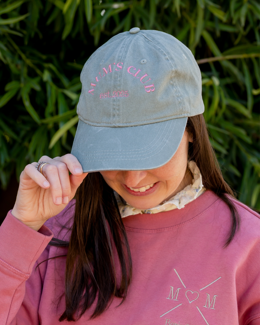 Customised mint green cap with two phrases