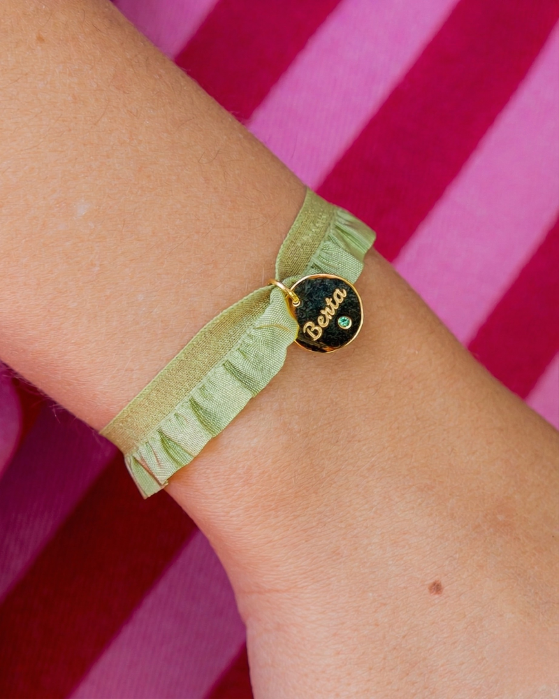 Personalised green semi-riso bracelet with zirconia charm