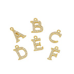 Charm inicial circonitas gold